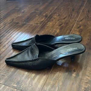 Nicole Black Leather Mules with Polished Finish
